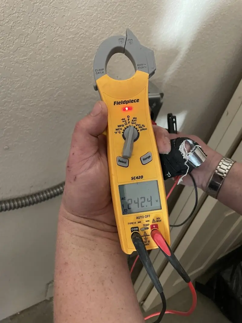 Voltage testing with clamp meter during Generator Installation in Thornton